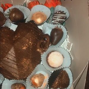 Chocolate covered strawberries and gifts